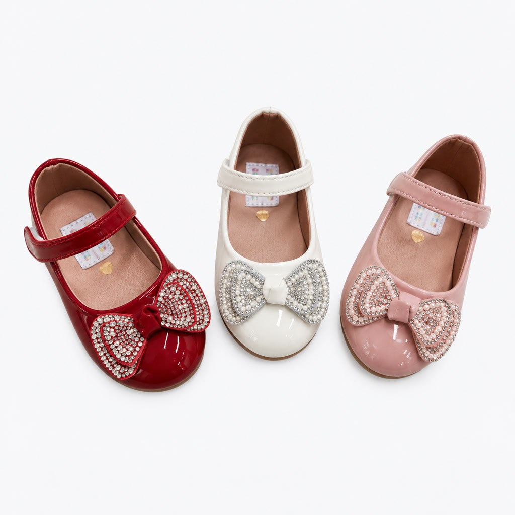 Zapato de charol para niña con moño doble de textura brillante